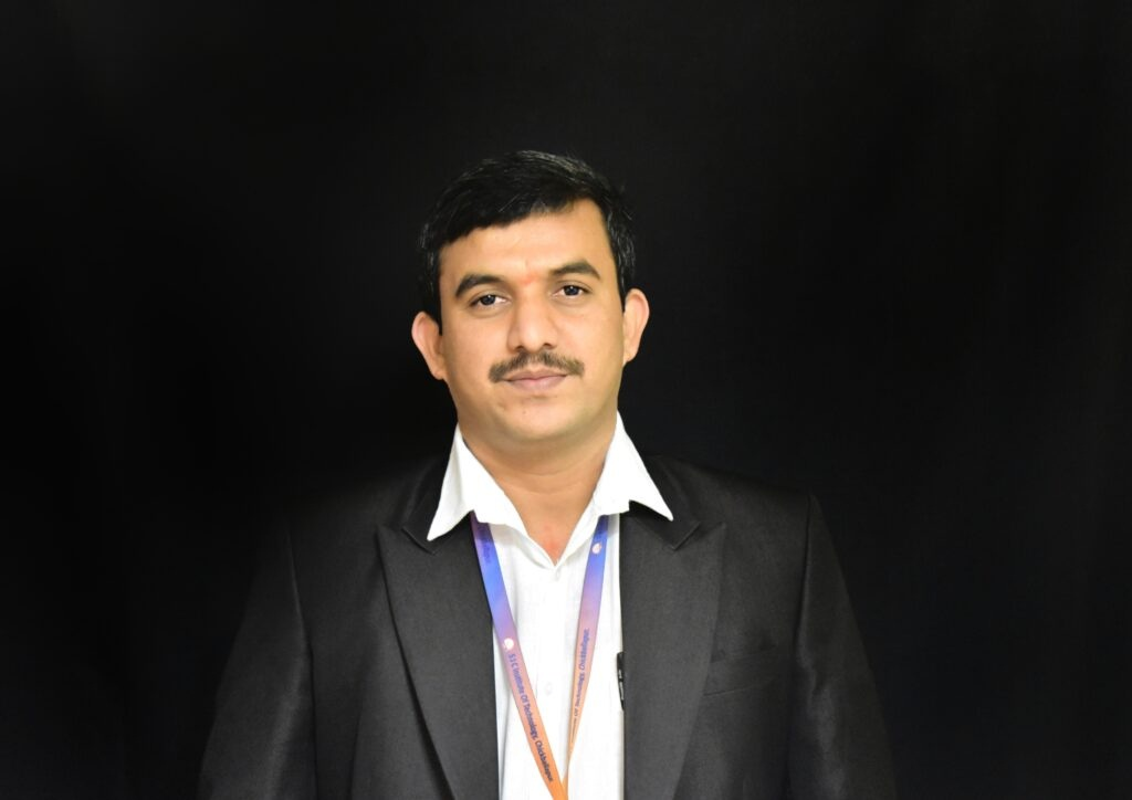 Dr. Ravikumar T R